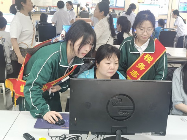 中江職中財經(jīng)商貿(mào)系學(xué)生參與稅務(wù)局稅收科普活動，助力稅法知識普及1.jpg